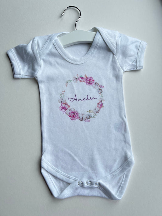 Personalised with "Amelia" baby vest.KiddioBaby & Toddler